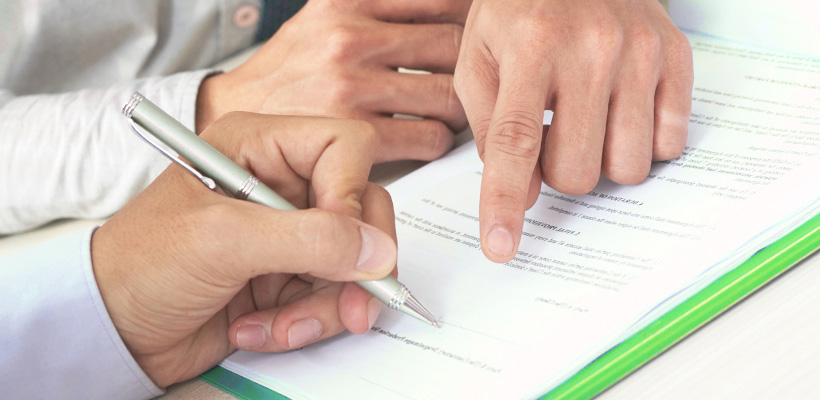 Doctors filling up paperwork